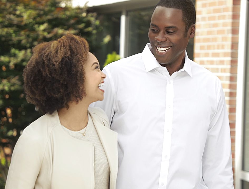 Man and Woman Smiling Outside