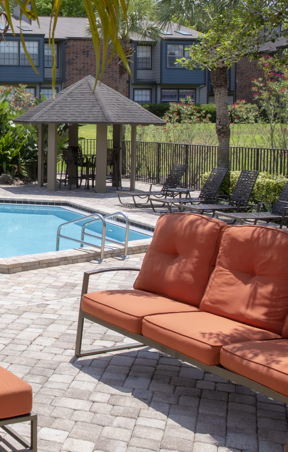 Pool Seating at Tiffany Oaks luxury apartment homes in Orlando , FL
