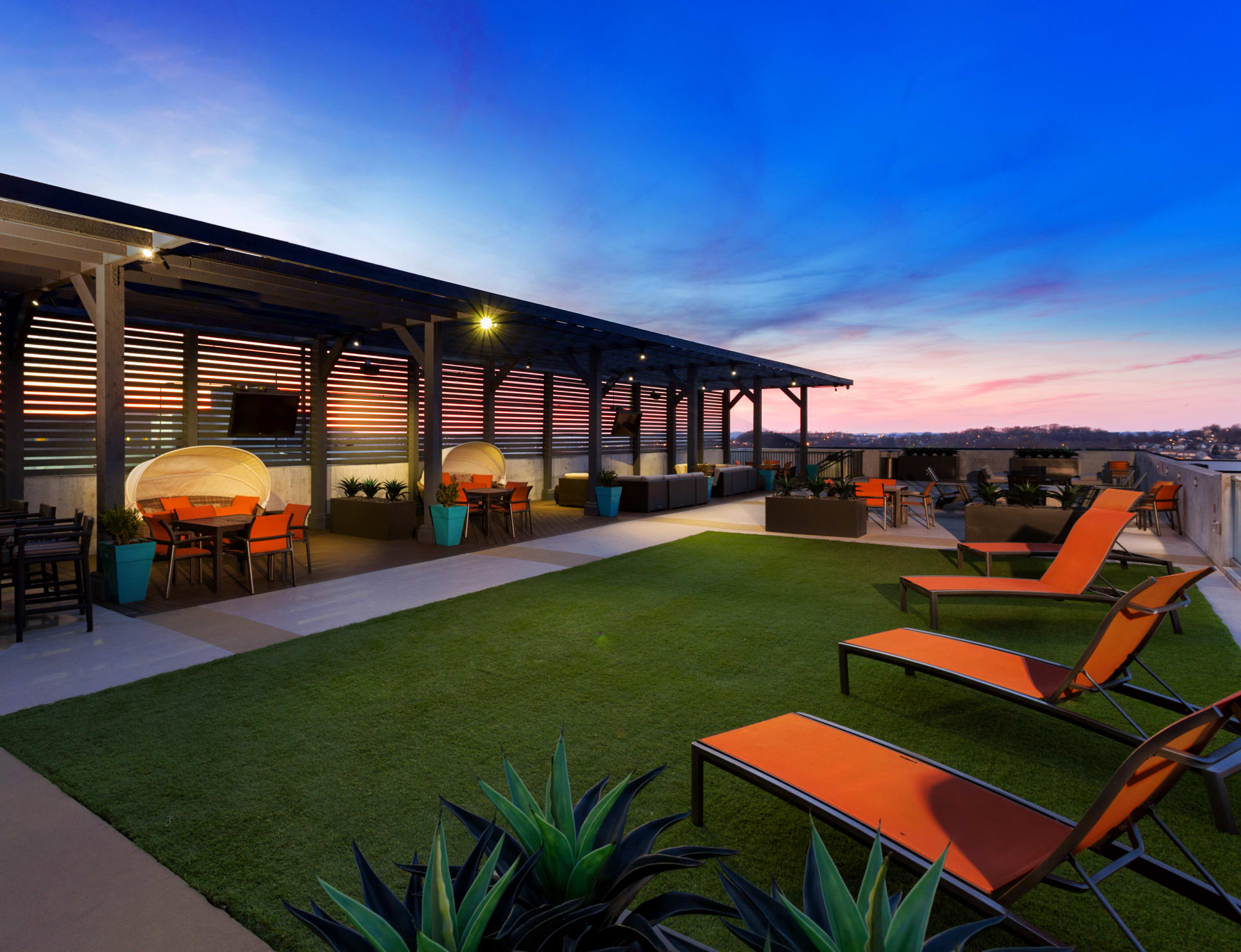 Rooftop Terrace at Dusk at Acklen West End luxury apartment homes in Nashville, TN