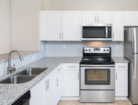 Kitchen 2 at Post Riverside luxury apartment homes in Atlanta , GA