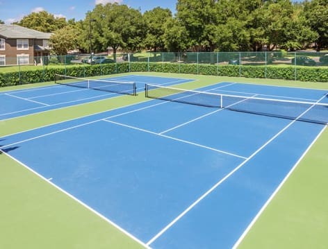 Tennis Court at Colonial Grand at Heathrow luxury apartment homes in Orlando, FL