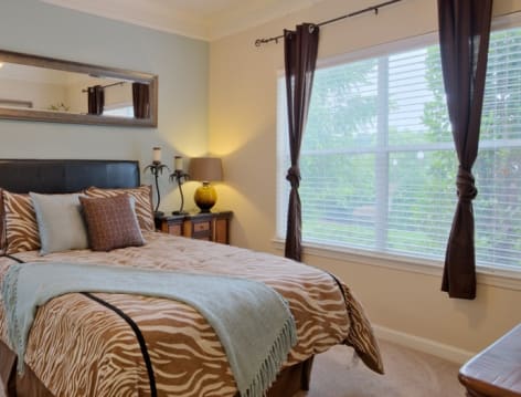 Bedroom at Colonial Grand at Cornelius luxury apartment homes in Charlotte, NC