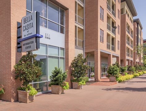 Exterior signage at Bella Casita luxury apartment homes in Dallas, TX