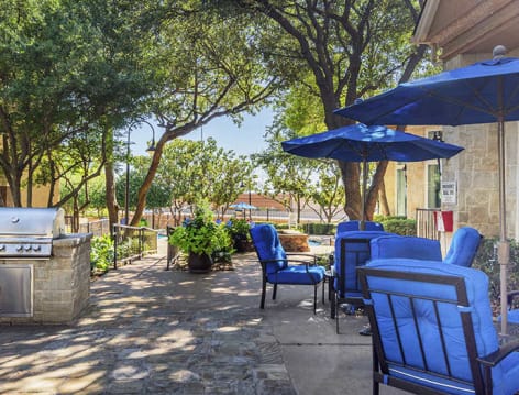 Outdoor grill area 2 at Colonial Village at Willow Creek luxury apartment homes in Dallas, TX