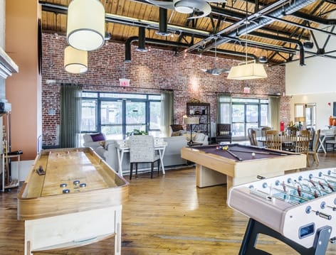 Game room at The Apartments at Cobblestone Square in Fredericksburg, VA