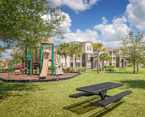 Picnic Area & Playground at Colonial Village at Twin Lakes luxury apartment homes in Sanford, FL