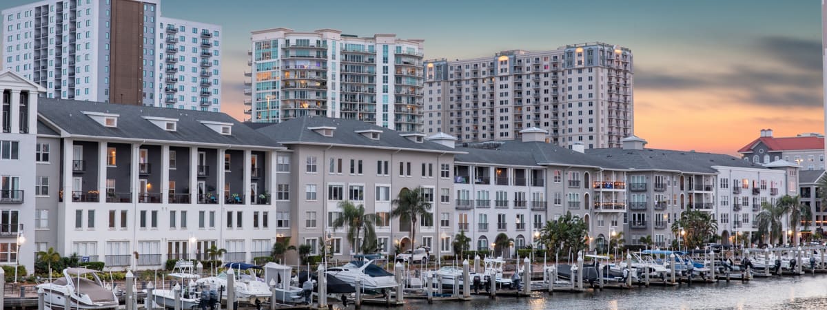 Exterior Over Water at Night at Post Harbour Place luxury apartment homes in Tampa, FL