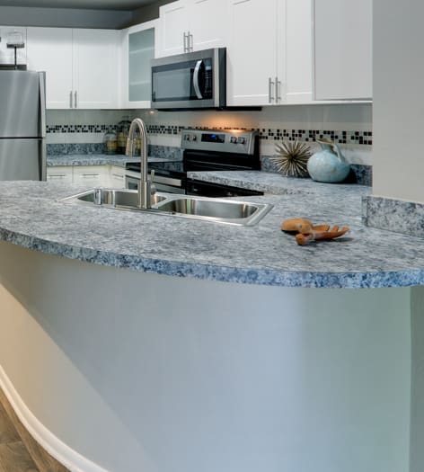 Kitchen at Post Square luxury apartment homes in Dallas, TX