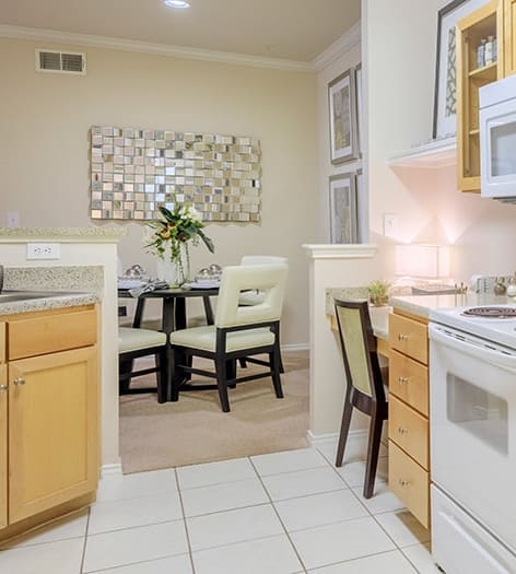 Kitchen 7 at Colonial Grand at Canyon Pointe luxury apartment homes in Austin, TX