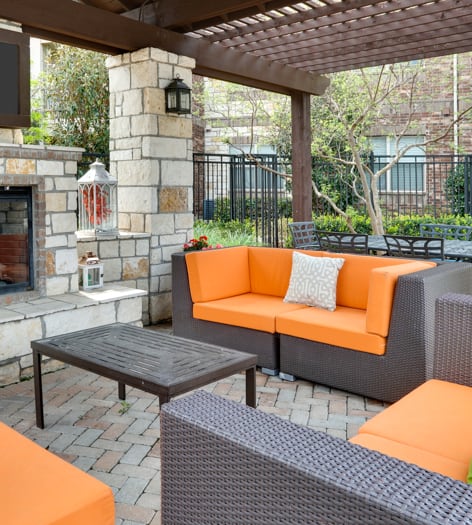Pool Sitting Area at Colonial Grand at Fairview luxury apartment homes in Fairview, TX