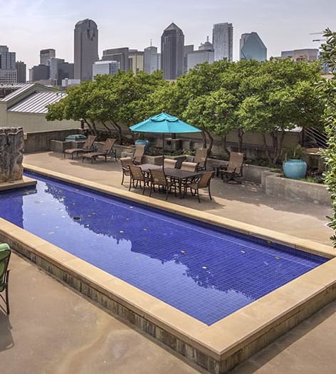 Outside seating at Post Gallery luxury apartment homes in Dallas, TX