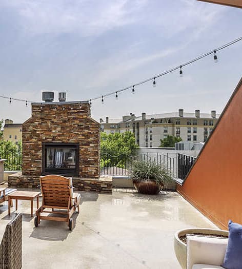 Rooftop seating area 2 at Post Square luxury apartment homes in Dallas, TX
