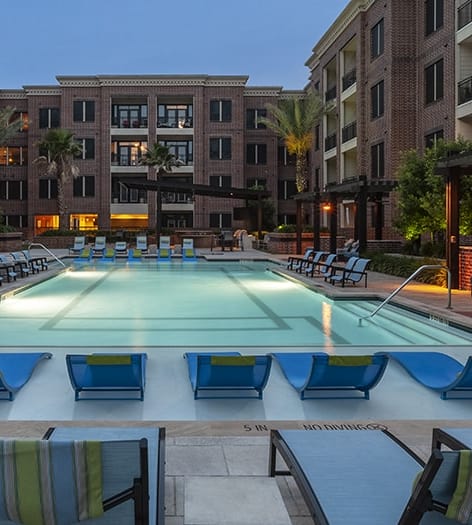 Pool view at night at Yale at 6th luxury apartment homes in Houston, TX