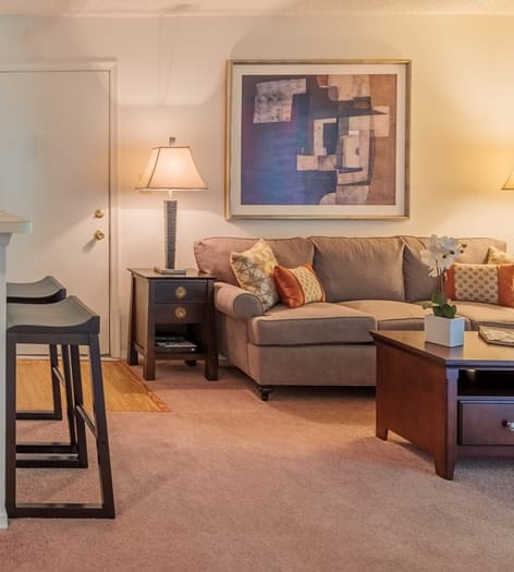 Living room & dining room at Colonial Village at Ashley Park luxury apartment homes in Richmond, VA