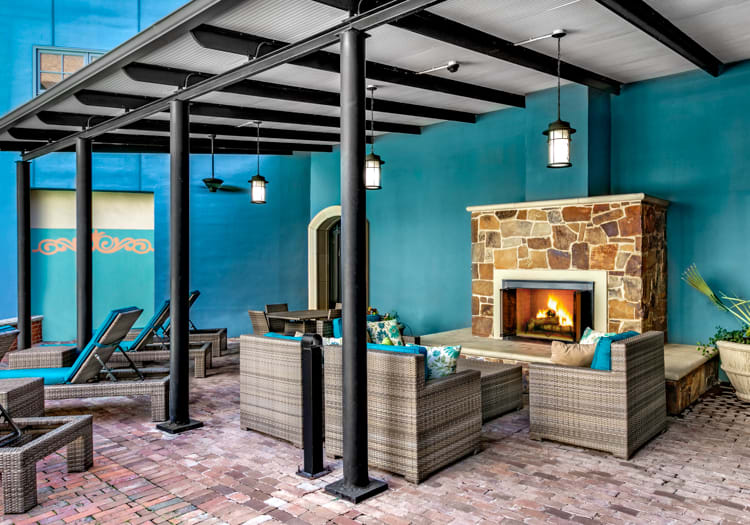 Fireplace at Pool at Post Addison Circle luxury apartment homes in Dallas, TX