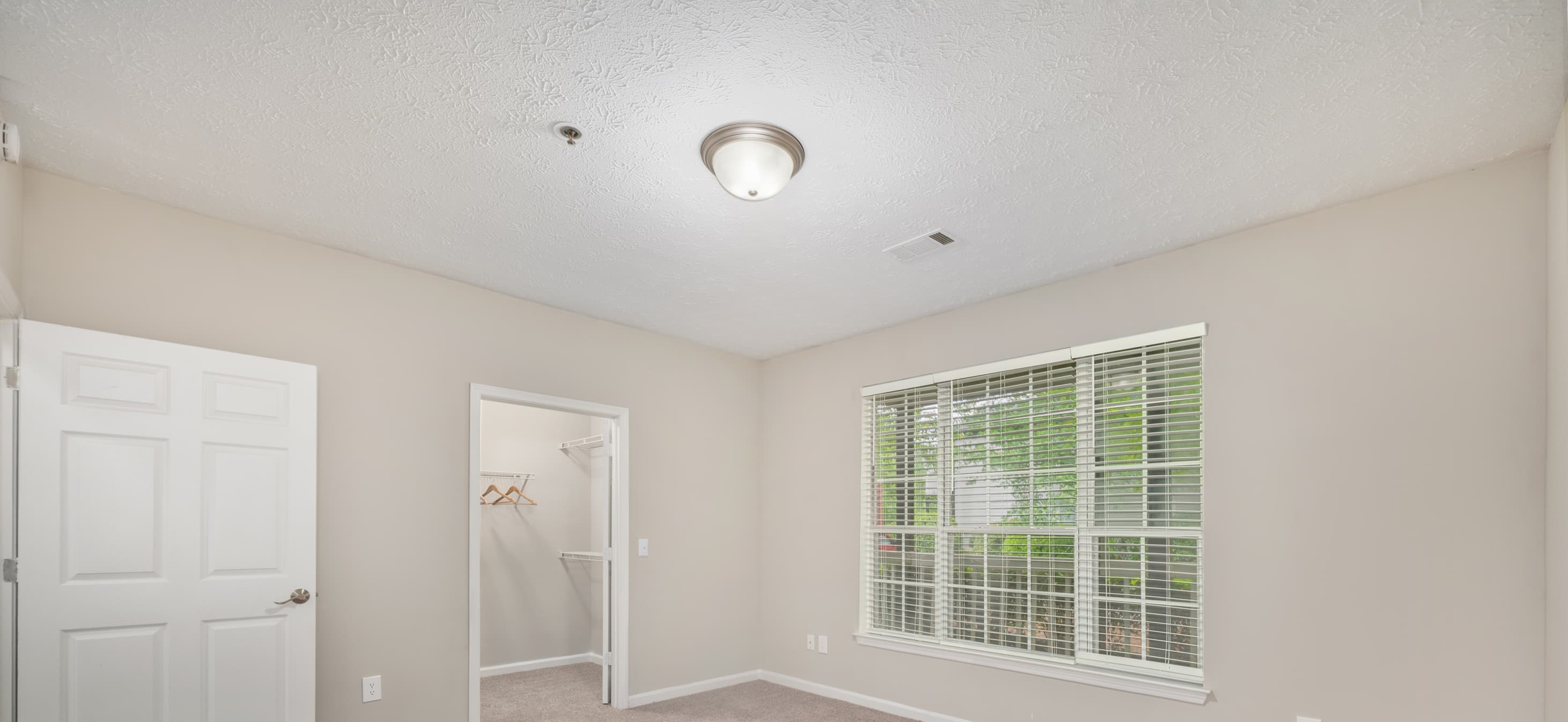 Bedroom at MAA River Oaks luxury apartment homes in Atlanta, GA