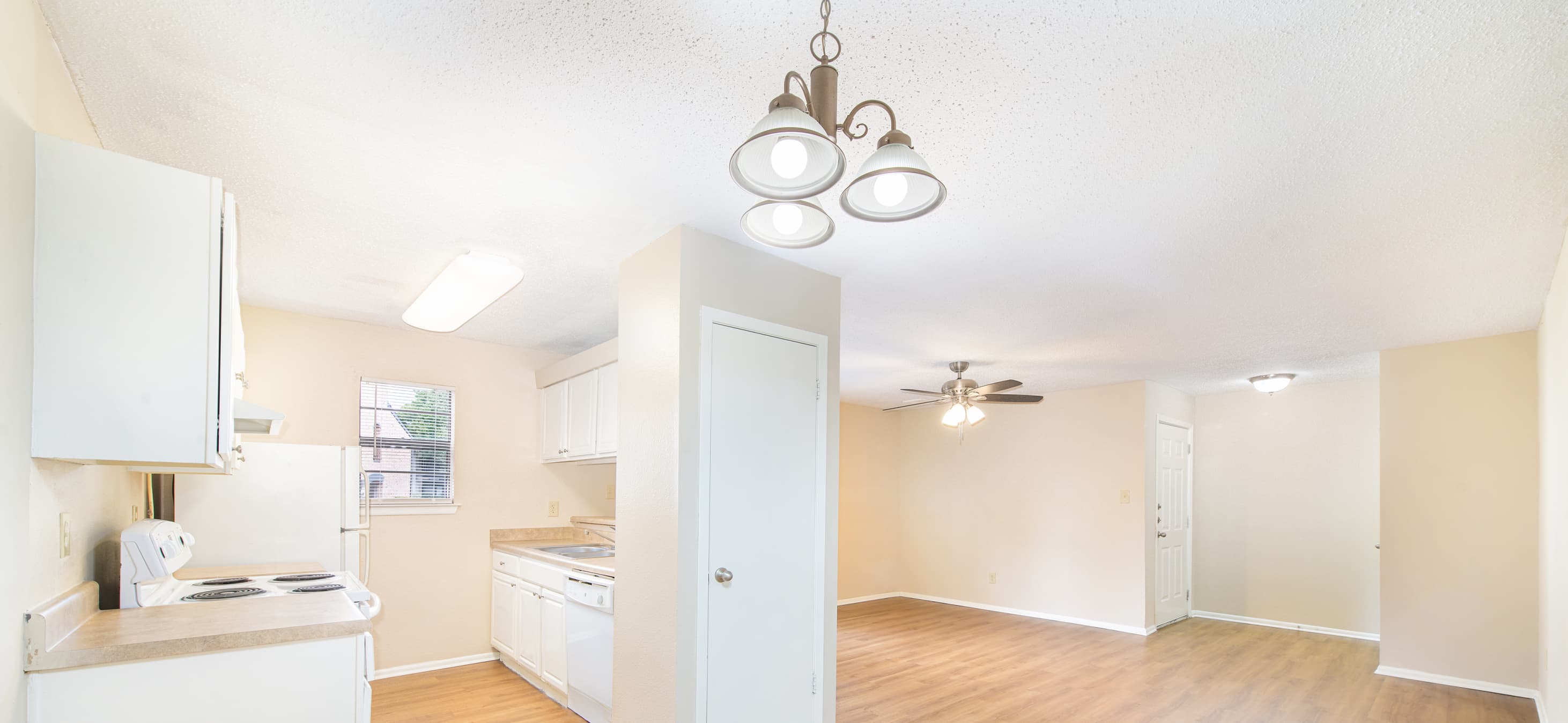 Kitchen and dining area at Balcones Woods luxury apartment homes in Austin, TX