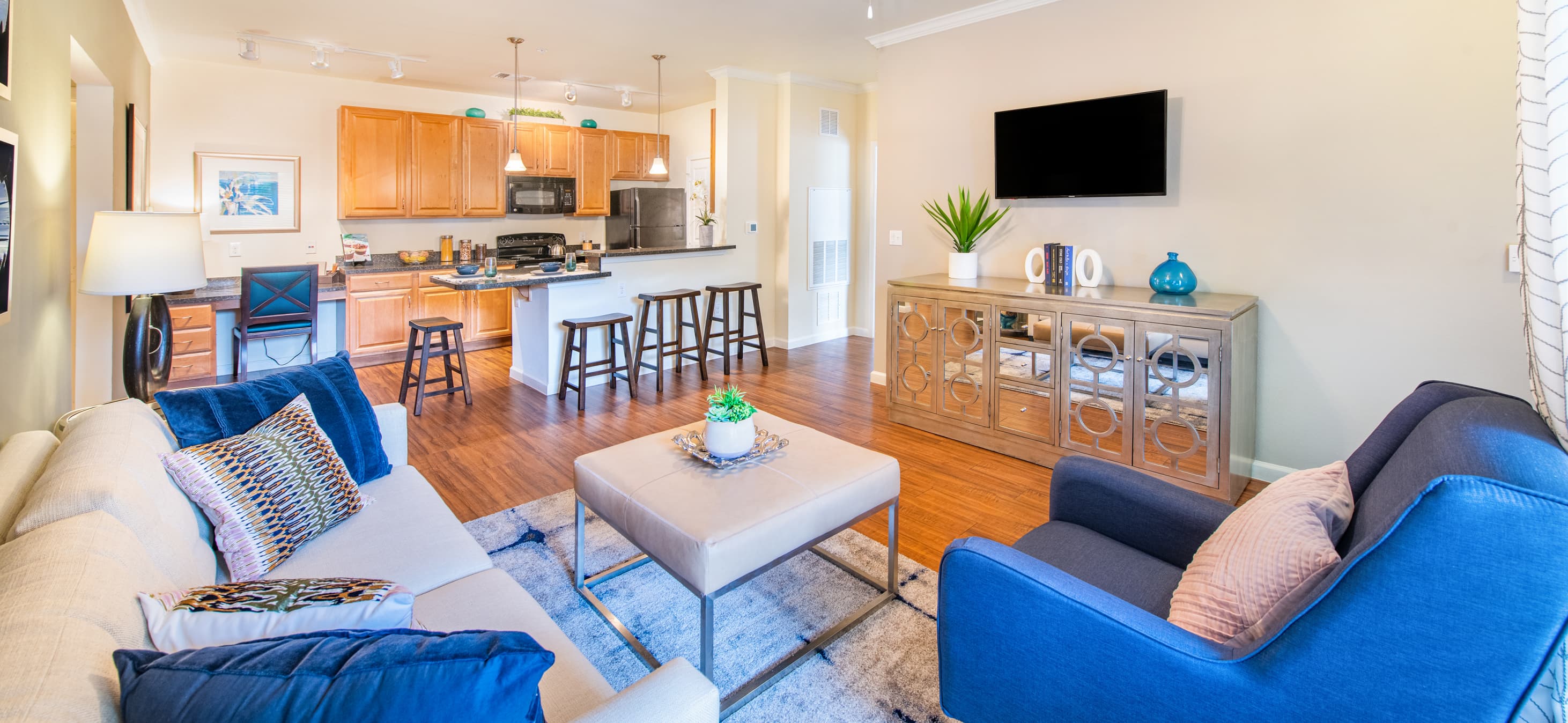 Living room and Kitchen at MAA Double Creek luxury apartment homes in Austin, TX