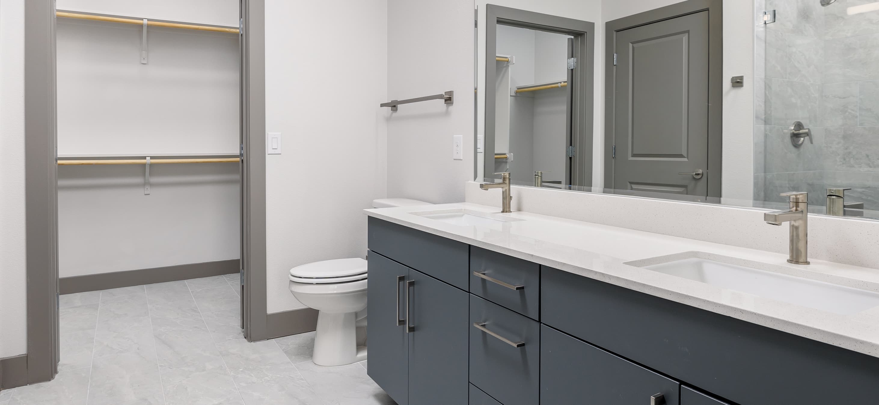 Bathroom with closet at MAA Windmill Hill Luxury Apartments in Austin, TX