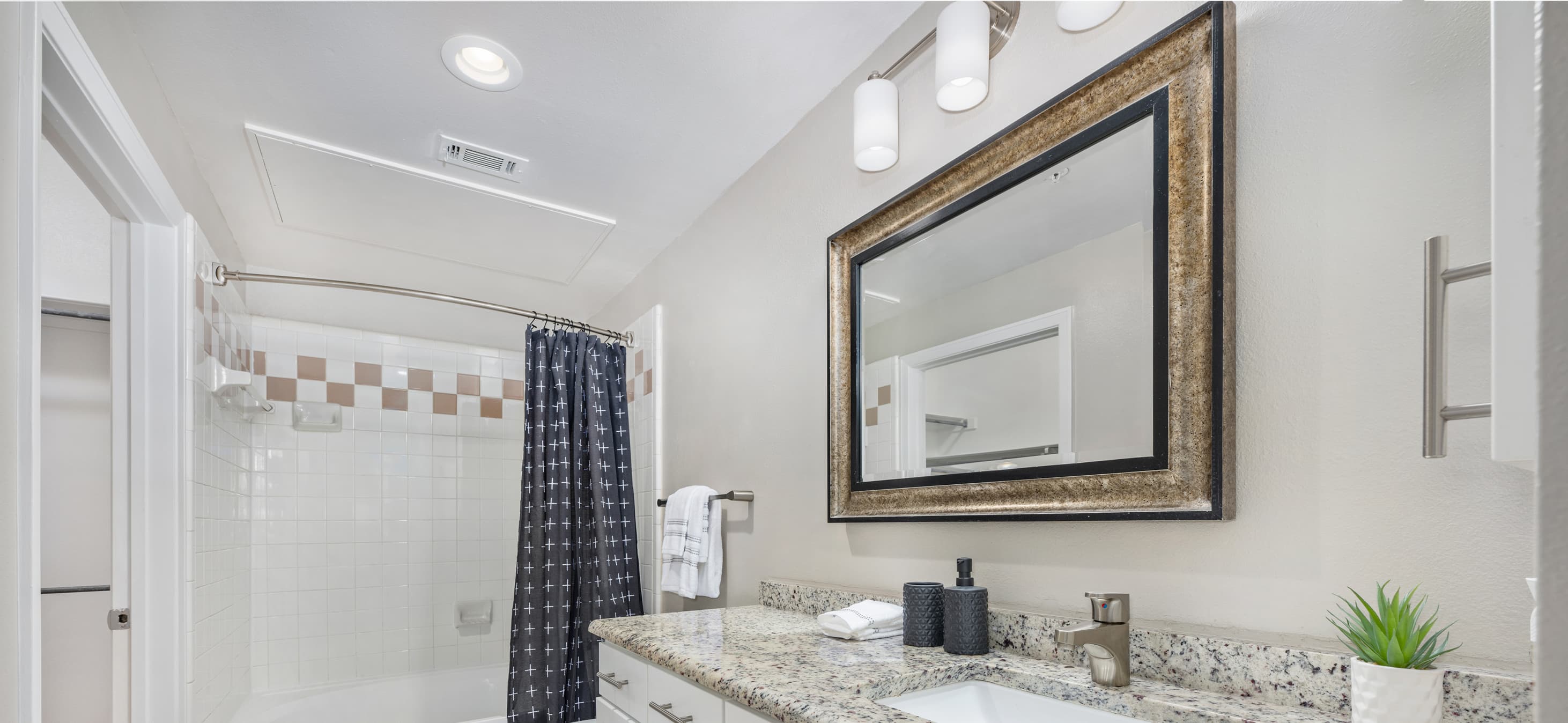 Bathroom at MAA Addison Circle luxury apartment homes in Addison, TX