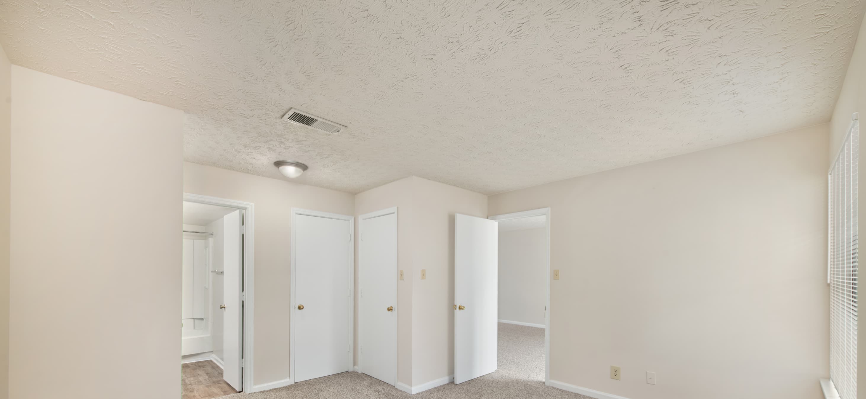 Bedroom at MAA Mansion luxury apartment homes in Raleigh, NC