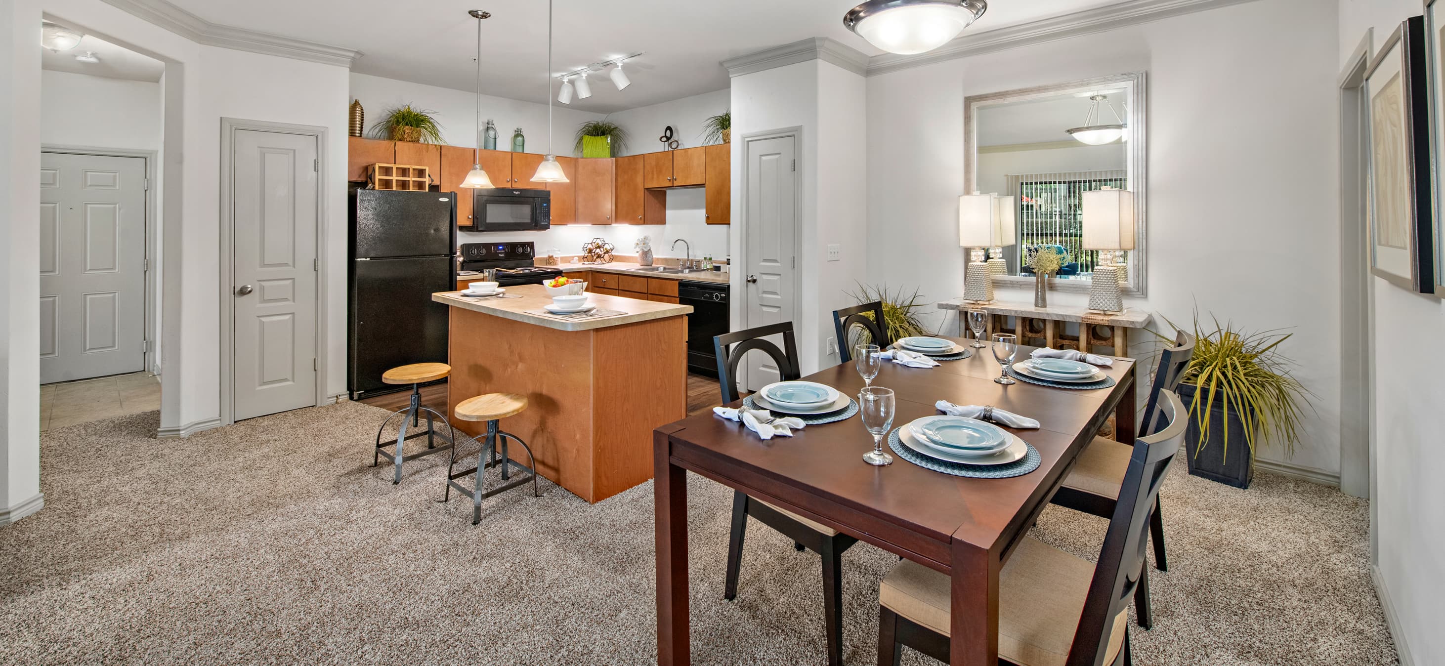 Kitchen and Dining at MAA Fall Creek luxury apartment homes in Houston, TX