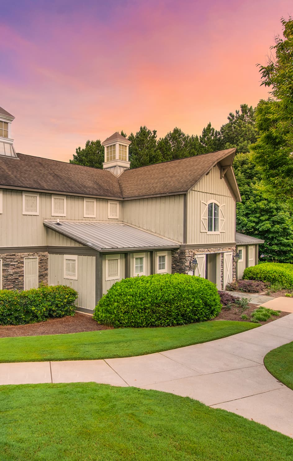 Leasing office at dusk at MAA McDaniel Farm luxury apartment homes in Atlanta, GA