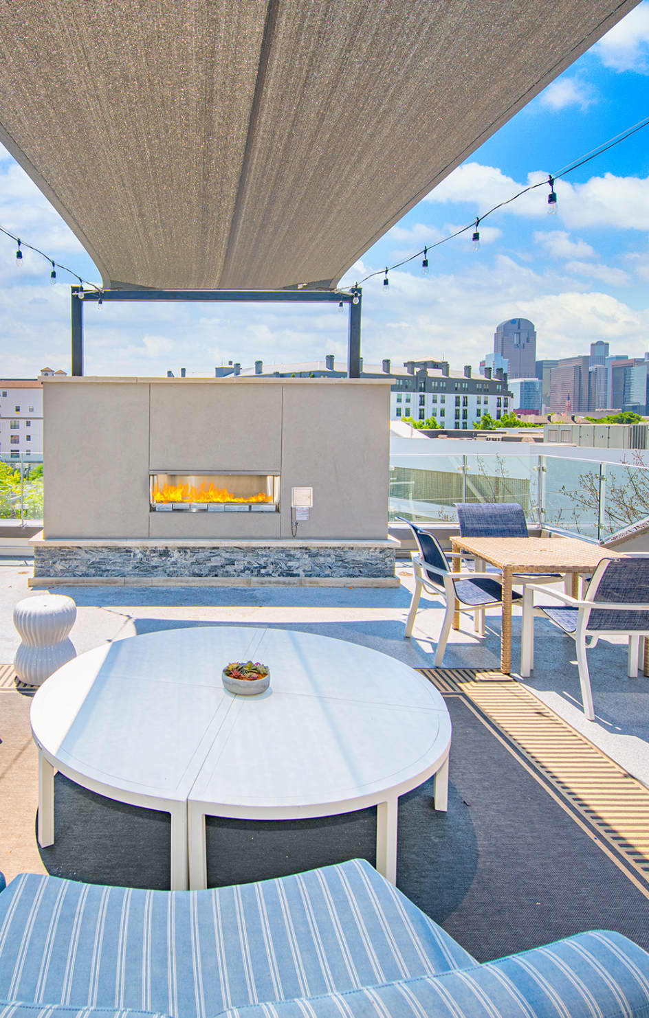 Sky terrace fire pit at MAA McKinney Ave luxury apartment homes in Dallas, TX
