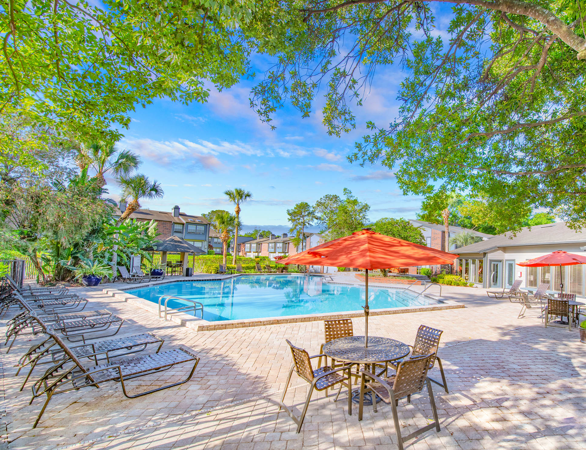 Pool at MAA Tiffany Oaks luxury apartment homes in Orlando , FL