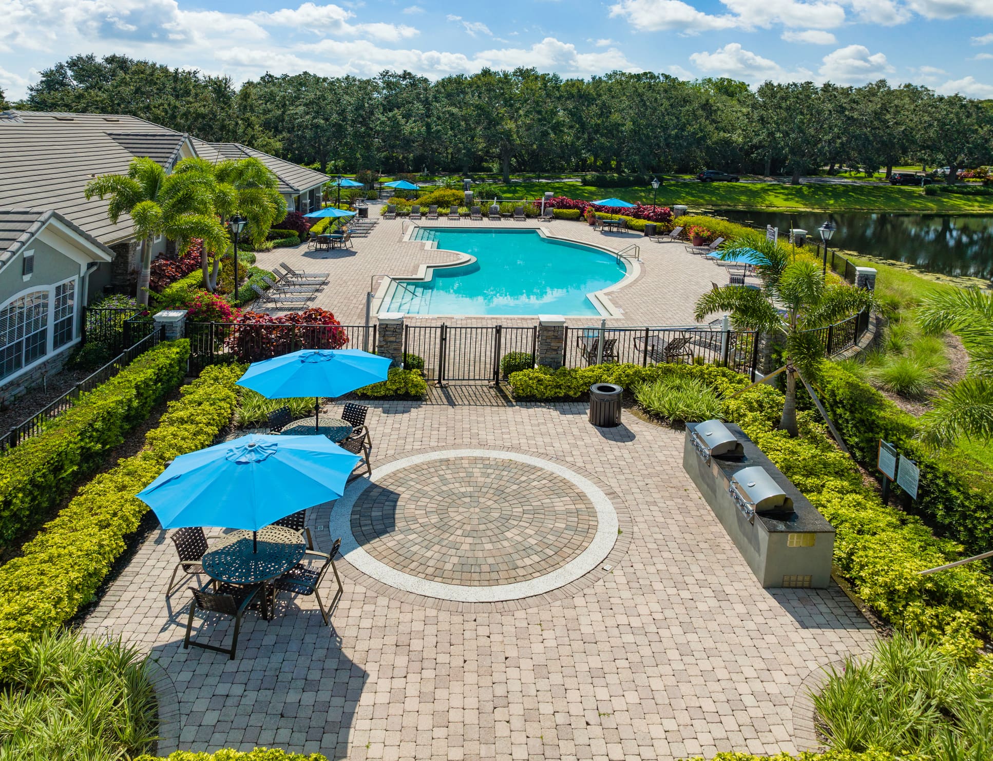 Grilling Area and Pool at MAA Lakewood Ranch luxury apartment homes in Tampa, FL