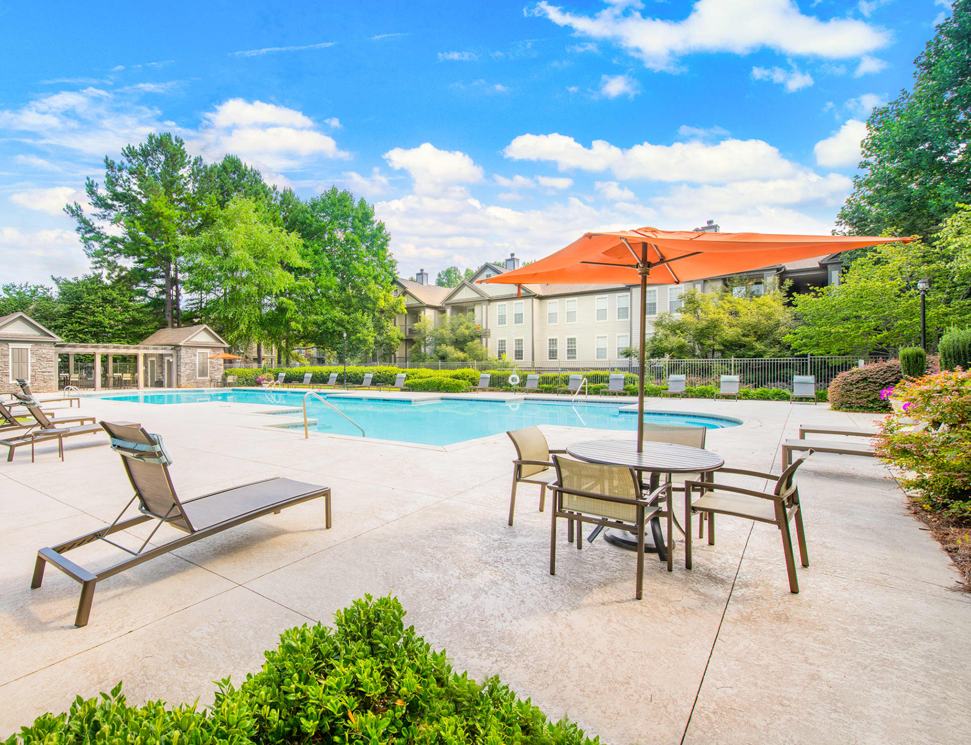 Outdoor swimming pool at MAA McDaniel Farm luxury apartment homes in Atlanta, GA