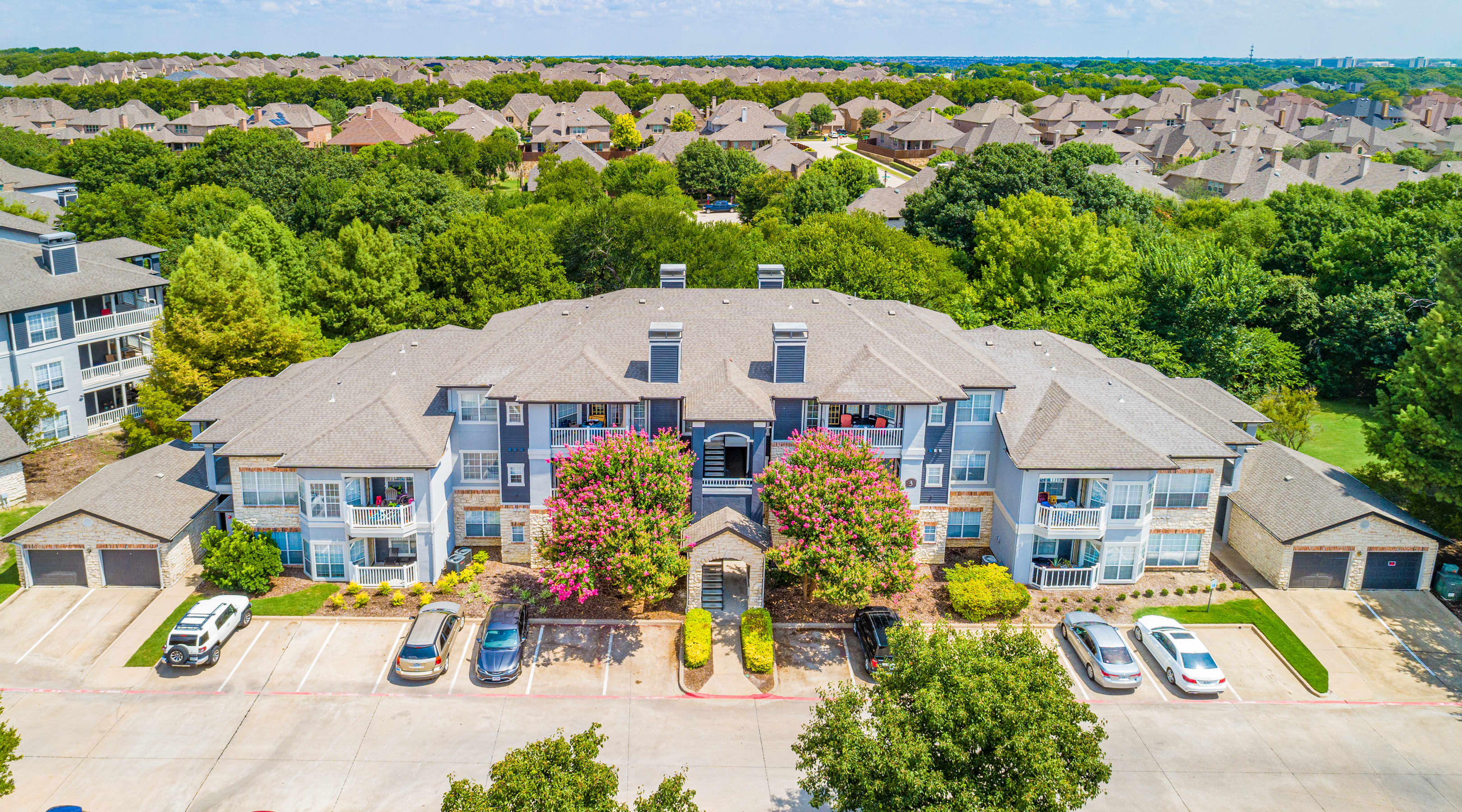 Building exterior at MAA Stonebridge Ranch luxury apartment homes in McKinney, TX