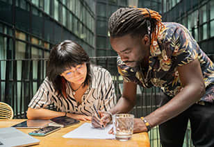 Coworking pair stock photo at MAA Nixie in Raleigh, NC