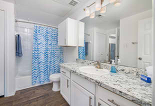 Bathroom at MAA Kirkwood luxury apartment homes in Stafford, TX