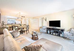 Living room at MAA Carrollwood luxury apartment homes in Tampa, FL