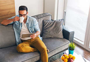 Man sipping coffee stock photo at MAA Nixie in Raleigh, NC