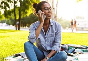 Woman on phone at MAA Nixie in Raleigh, NC