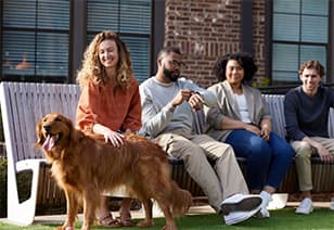 Four friends and a golden retriever at MAA Nixie in Raleigh, NC