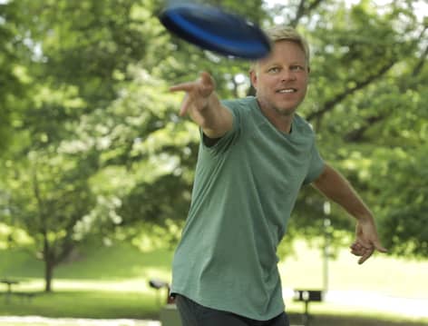 Man throws frisby