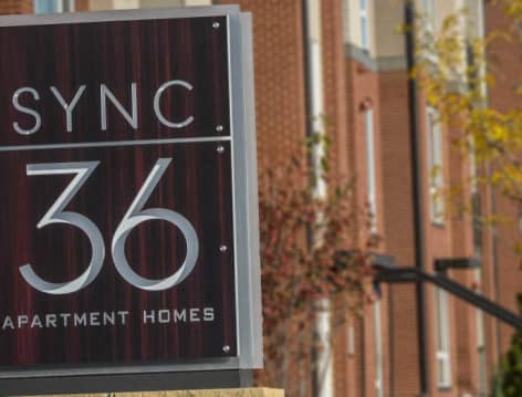 Signage at Sync36 luxury apartment homes in Westminster, CO