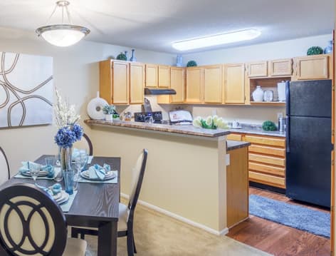 Living Room and Kitchen at The Paddock Club Brandon luxury apartment homes in Tampa, FL