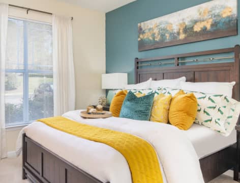 Bedroom at Colonial Grand at Research Park luxury apartment homes in Durham, NC