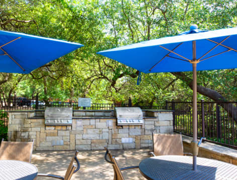 Grilling at Colonial Grand at Canyon Creek luxury apartment homes in Austin, TX