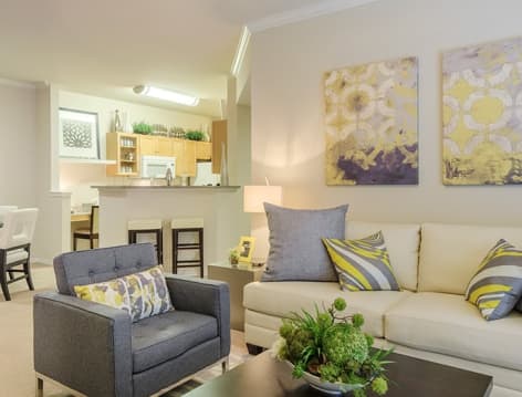 Dining Room and Living Room at Colonial Grand at Canyon Pointe luxury apartment homes in Austin, TX