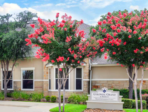 Exterior Leasing Office at Colonial Grand at Hebron luxury apartment homes in Dallas, TX