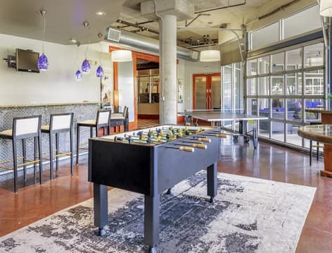 Game room at Colonial Reserve at Las Colinas luxury apartment homes in Irving, TX near Dallas