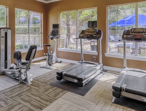 Fitness center at Colonial Village at Shoal Creek luxury apartment homes in Dallas, TX