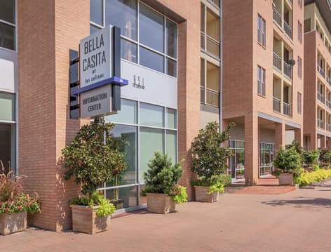 Exterior signage at MAA Bella Casita luxury apartment homes in Dallas, TX