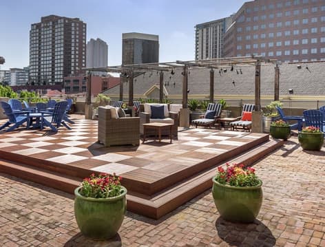 Rooftop Seating & Skyline Views at MAA McKinney Avenue luxury apartment homes in Dallas , TX