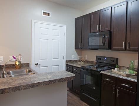 Kitchen at Cypresswood Court luxury apartment homes in Houston, TX